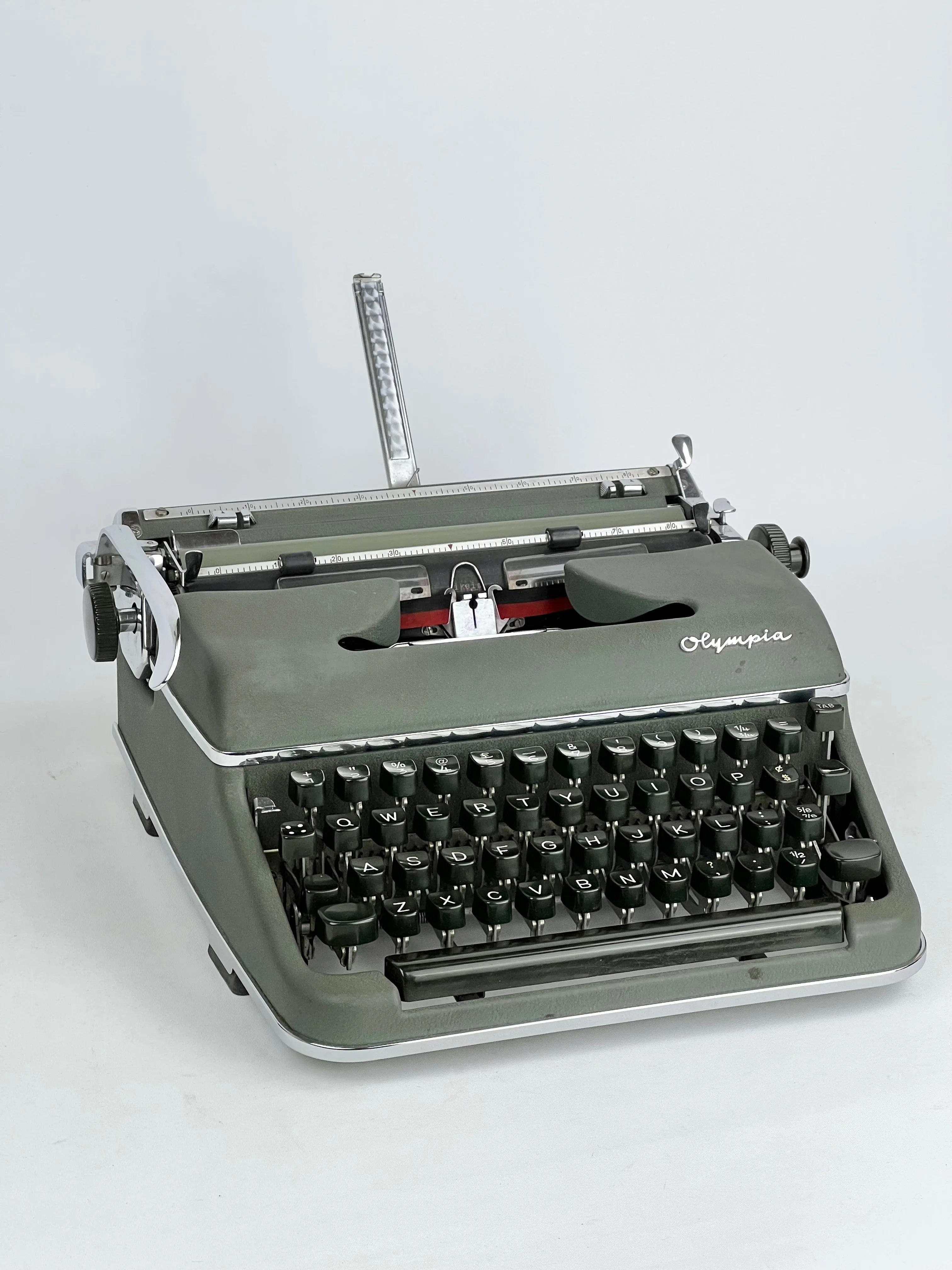 1950s Olympia Deluxe Sage Portable Typewriter in Shell Case