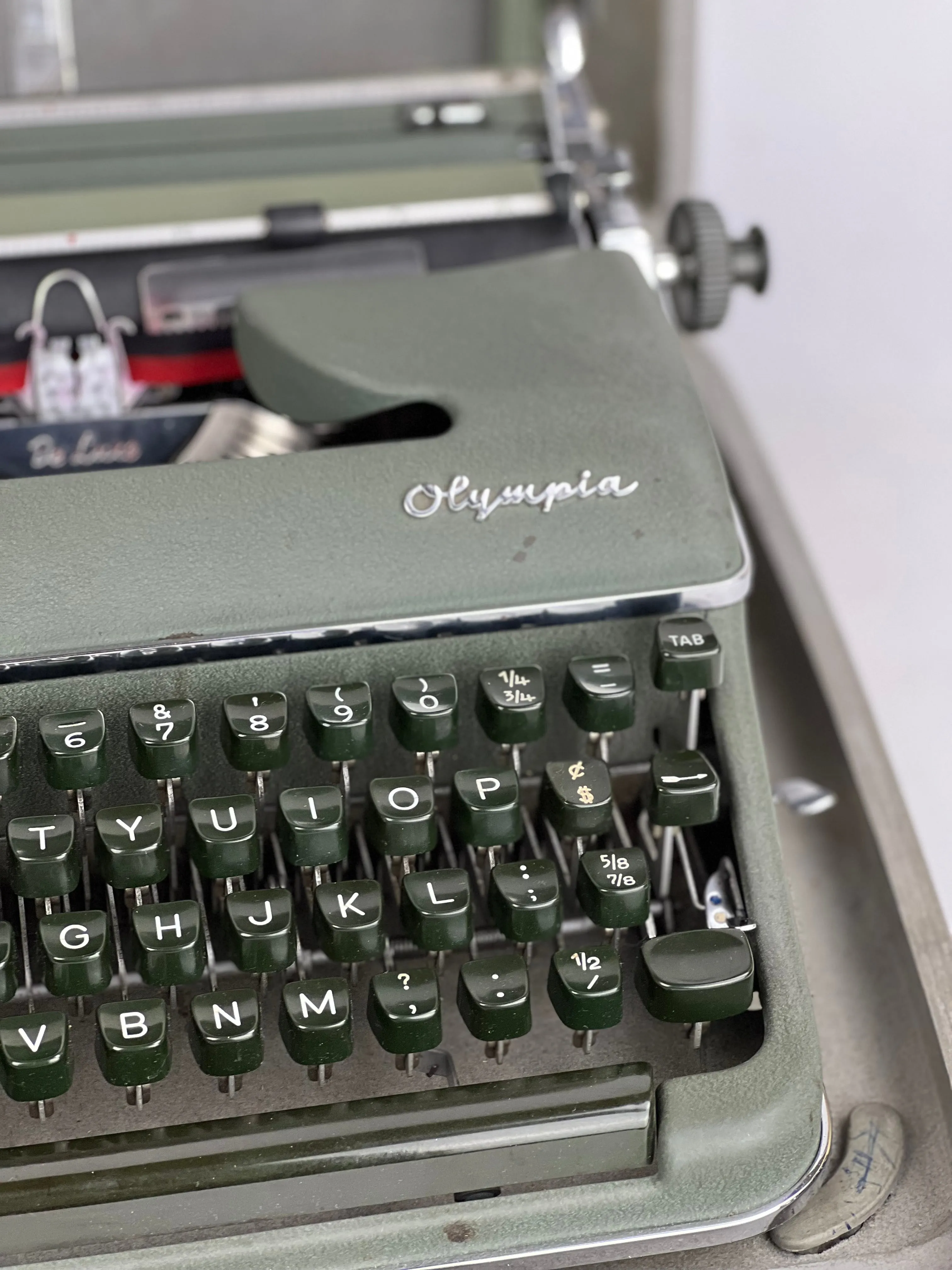 1950s Olympia Deluxe Sage Portable Typewriter in Shell Case