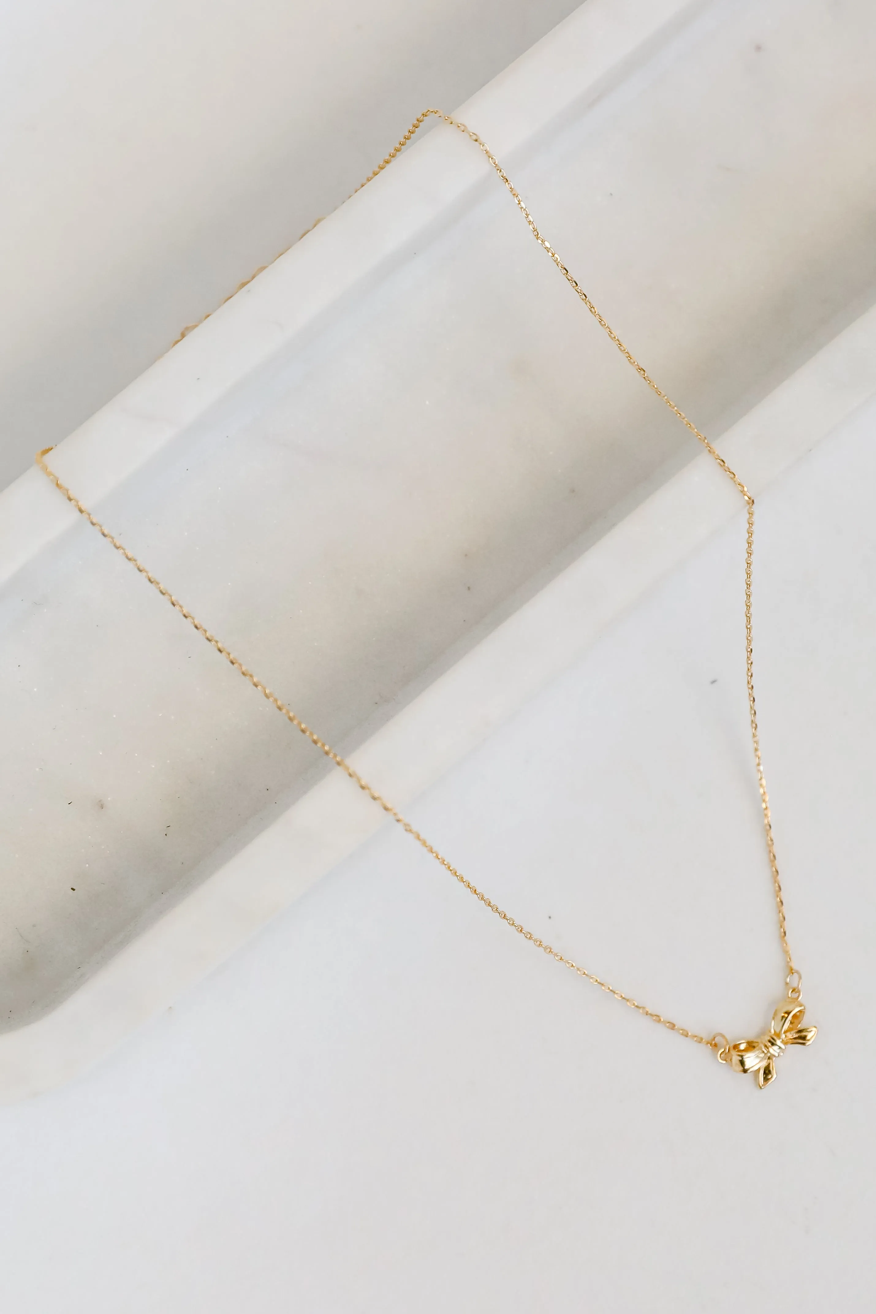 Brooke Gold Bow Charm Necklace